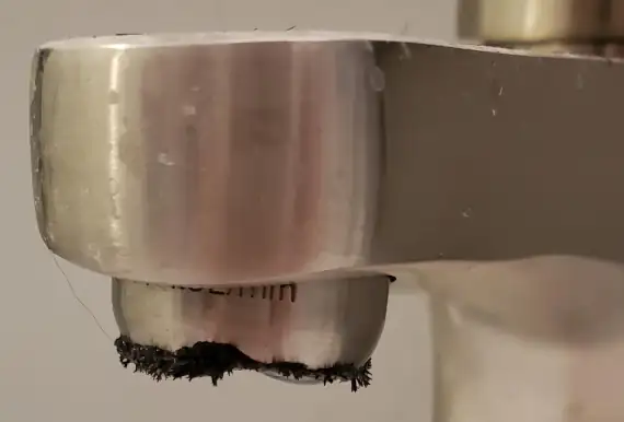 Biofilm growth on a tap
