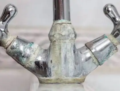 Ruined chrome finish on a tap because of limescale